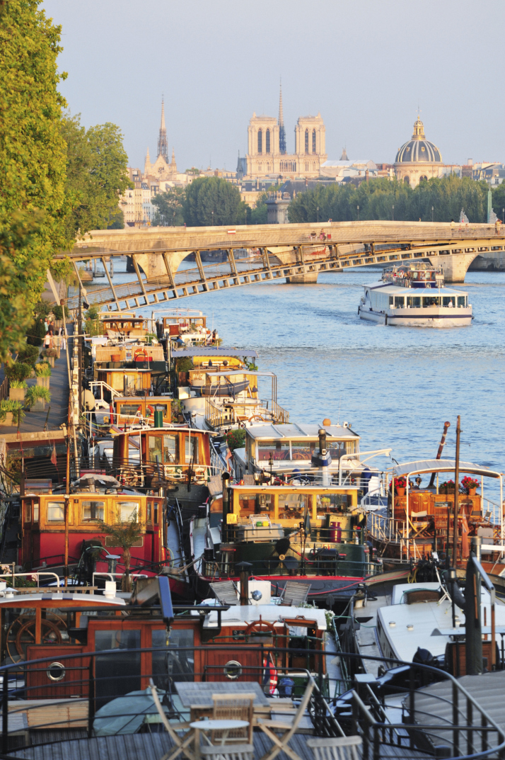 Houseboats Bridges Notre dame on Seine River Paris
